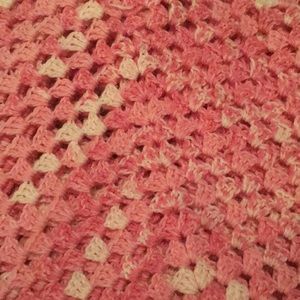 Hand knitted blanket.